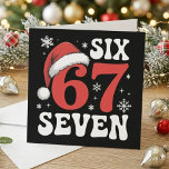 Funny Six Seven Santa Hat Christmas Saying Holiday Card<br><div class="desc">This festive typography design features the funny “six seven” phrase with a Santa hat and winter snowflakes on a dark background. The bold red and white lettering gives it a playful holiday look that stands out for Christmas humor and seasonal meme-style designs. A fun choice for anyone who likes number...</div>