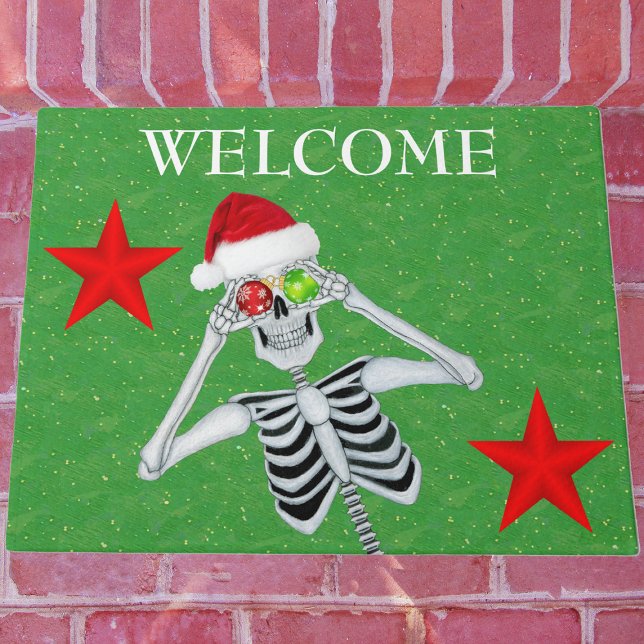 Funny Skeleton Ornament Eyes Santa Hat Stars Green Doormat (fun Christmas skeleton Santa Hat ornaments red stars on green welcome outdoor mat.)
