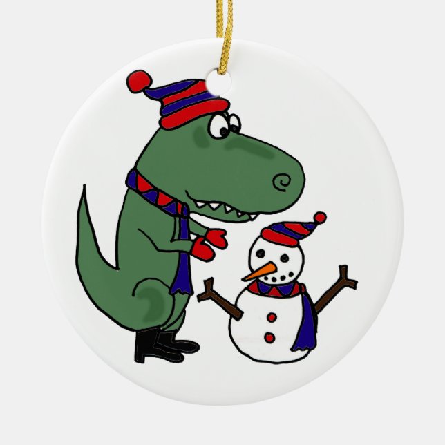Funny T-Rex Dinosaur Building Snowman Ceramic Ornament (Front)