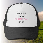 Funny Text | World's Best Surgeon Ever | Gift  Trucker Hat<br><div class="desc">Funny Ellegant Text | White and Pink | World's Best Surgeon Ever | Gift for a Surgeon. Wearing this shirt could be a fun way to show pride in one's profession or to celebrate a personal achievement. It could also serve as a conversation starter and a way to connect with...</div>