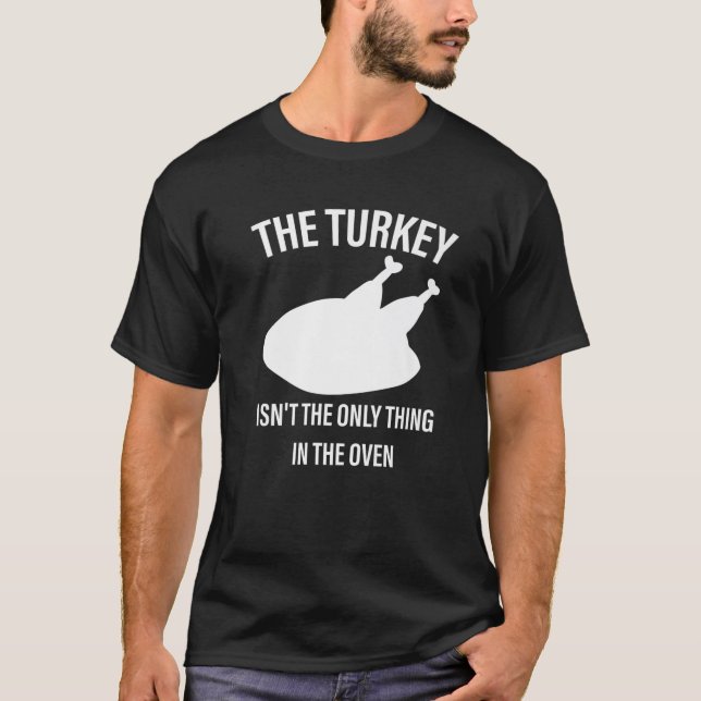 Funny Thanksgiving Graphic The Turkey Isn't The On T-Shirt (Front)