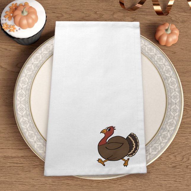 Funny Thanksgiving Turkey Cloth Napkins (A cute turkey trotting along on this white cloth napkin)