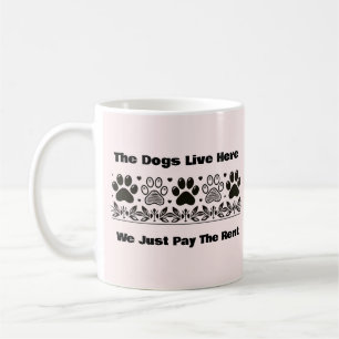 Funny The Dogs Live Here We Just Pay The Rent Coffee Mug