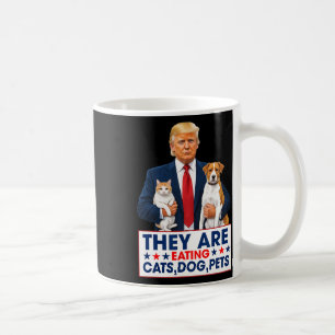 Funny They Are Eating The Dogs The Cats The Pets  Coffee Mug