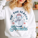 Funny Tis The Season To Be Freezing Snowman Winter Sweatshirt<br><div class="desc">Get ready to be the life of the holiday party in this hilarious Funny Tis The Season To Be Freezing Snowman Winter Sweatshirt. This retro snowman crewneck sweatshirt features a funny graphic print that playfully jokes "Tis The Season To Be Freezin'." The super soft fabric keeps you cozy and comfortable...</div>