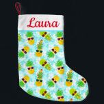 Funny Tropical Christmas Pineapples Small Christmas Stocking<br><div class="desc">Funny, tropical Christmas pineapples wearing sunglasses and festively decorated with Christmas lights, ornaments and candy canes. This pattern has a pastel blue background with Hawaiian hibiscus flowers. Customize this fun and unique Christmas stocking with a name or text in any color and font. Perfect for a tropical or beach theme...</div>