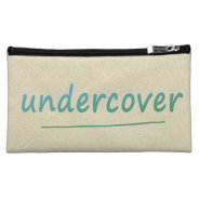 Funny Undercover Shiny Turqoise Text On Any Color Makeup Bag at Zazzle