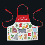 Funny Vegetable Fruit Faces Chef Kids Apron<br><div class="desc">This fun personalized apron features vegetables, fruit, kitchen utensils, a cutting board, a pot, and even a blender, most with silly faces. The top and straps are a solid red, but they can be customized to any color you'd like. Easy to customize for a unique gift, perfect for the young...</div>
