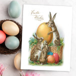 Funny Vintage Easter Rabbits and Dyed Eggs Postcard<br><div class="desc">Whimsical restored antique Easter greeting card featuring three brown and white bunnies with basket,  grass,  dyed Easter eggs and greeting. Back features optional bunny graphic.</div>
