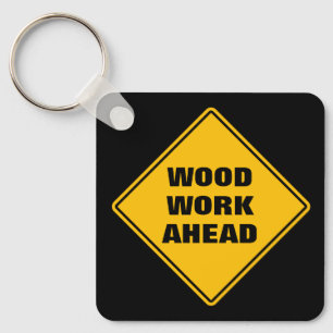 Funny yellow wood work ahead caution road sign keychain