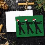 Funny Zombie in Santa Hats Green Christmas Postcard<br><div class="desc">Zombies in red Santa hats walking in line with dead arms or stretched in front of them. An awesome zombie Christmas green postcard for a horror fan.</div>