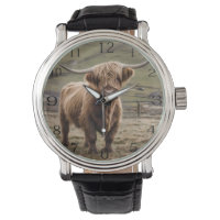 **"Furry Majesty: The Woolly Brown Highland Cow"**