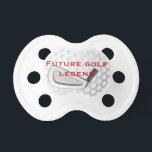 Future Golf Legend Golfing Baby Pacifier<br><div class="desc">This fun golf themed baby pacifier has the look of a dimpled golf ball on it, with an illustration of a golf club, with changeable text that says "Future Golf Legend" in red on it. Perfect for the baby of parents who love golf. Makes a nice, unique baby gift. It...</div>
