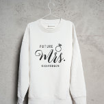Future Mrs. Bride, Fiancé Engagement Gift Custom Sweatshirt<br><div class="desc">Future Mrs. Bride, Fiancé Engagement Gift Custom name sweatshirt. This shirt makes a nice gift for the glowing bride-to-be! This cozy and stylish sweatshirt features the words "Future Mrs." on the front, allowing her to proudly display her new surname-to-be. What makes this sweatshirt truly special is the customization option for...</div>