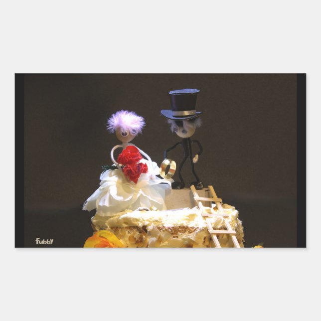 Fuzzy bride and groom on cake. rectangular sticker (Front)