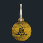 Gadsden Flag on Old Wood Grain Pet ID Tag<br><div class="desc">Feel free to modify the design according to your own preferences. You may change the design location, orientation, background colors and size. Also, you may add your own text, or slogan set its font, location and size, all in order to create the ultimate personal gift for you and your loved...</div>
