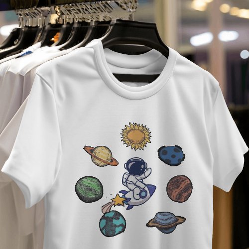 Galaxy dreaming explorer astronaut and planets T_Shirt