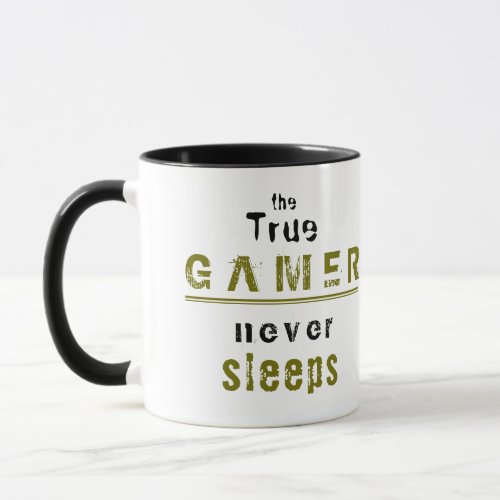 Gamer Coffee Mug - A perfect coffee mug for a true gamer with the text True gamer never sleeps. The background is white and the fonts are green and black. For people who love playing video games and computer games. This mug is a great gift idea for a real gamer.