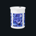 GARDEN FLOWERS PITCHER<br><div class="desc">A watercolor of a beautiful vibrant blue hydrangea.</div>