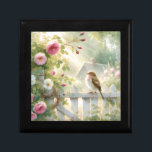 Garden Rose Bird Watercolor Scene Gift Box<br><div class="desc">A soft watercolor scene captures a gentle songbird resting on a white garden fence surrounded by blooming pink roses, leafy vines, and warm morning light. The palette glows with pastel greens, blush pinks, creamy whites, and sunlit gold, creating a calm cottagecore atmosphere filled with quiet charm. Loose painterly brushstrokes and...</div>