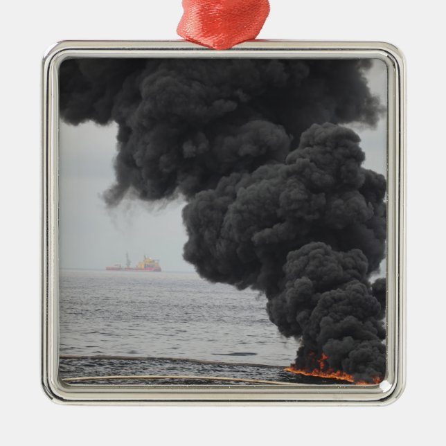 Gathered concentrated oil burns metal ornament (Front)