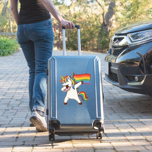 Gay Pride Dabbing Unicorn With Flag Sticker (Suitcase Insitu)