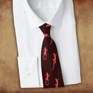 Geckos in red climbing up (on dark) neck tie