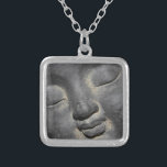 Gentle Buddha Face Stone Sculpture Silver Plated Necklace<br><div class="desc">This image is of a stone sculpture of a tranquil Buddha. Looking gentle and peaceful while meditating. Appealing to Buddhists,  meditators and spiritual types.</div>