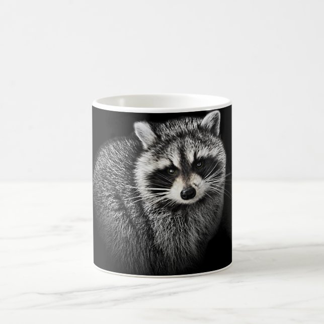 Gentle Raccoon Mug. On Black Coffee Mug (Center)