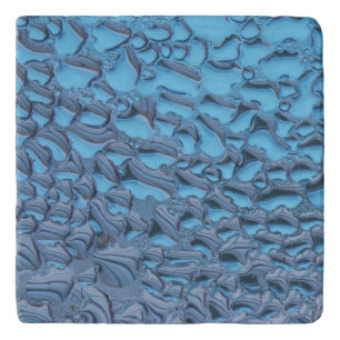 Gentle raindrops on blue glass trivet