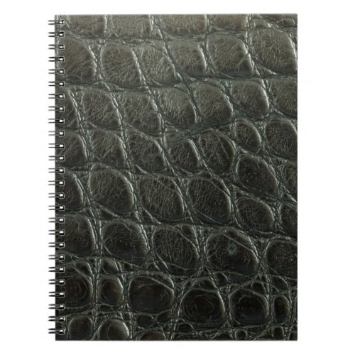 Genuine black alligator leather texture close up  notebook