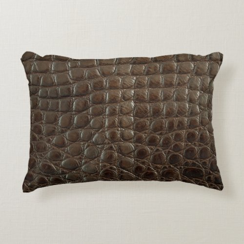 Genuine brown alligator leather close up to show  accent pillow