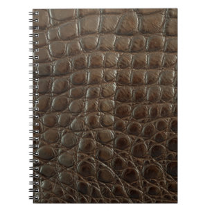 Genuine brown alligator leather, close up to show  notebook