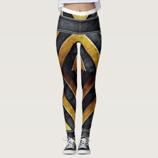 geometric black and gold pattern leggings
