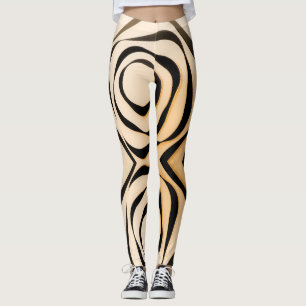 Geometric black spiral on reddish color background leggings