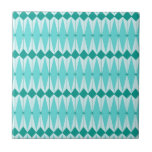 Geometric Diamonds & Starbursts Ceramic Tile<br><div class="desc">This Geometric Diamonds & Starbursts Small Ceramic Tile (small print) has all of the kitschy charm of something that is kitschy and charming. The vintage inspired design features a mod, peacock blue background with light blue, elongated hexagons, layered with turquoise diamonds, and peacock blue starbursts. It’s a kaleidoscope of retro...</div>