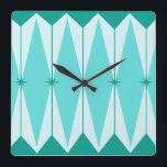 Geometric Diamonds & Starbursts Square Wall Clock<br><div class="desc">This Geometric Diamonds & Starbursts Square Acrylic Wall Clock has all of the kitschy charm of something that is kitschy and charming. The vintage inspired design features a mod, peacock blue background with light blue, elongated hexagons, layered with turquoise diamonds, and peacock blue starbursts. It’s a kaleidoscope of retro goodness!...</div>