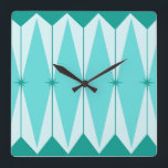Geometric Diamonds & Starbursts Square Wall Clock<br><div class="desc">This Geometric Diamonds & Starbursts Square Acrylic Wall Clock has all of the kitschy charm of something that is kitschy and charming. The vintage inspired design features a mod, peacock blue background with light blue, elongated hexagons, layered with turquoise diamonds, and peacock blue starbursts. It’s a kaleidoscope of retro goodness!...</div>