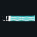 Geometric Diamonds & Starbursts Wrist Keychain<br><div class="desc">This Geometric Diamonds & Starbursts Wrist Keychain has all of the kitschy charm of something that is kitschy and charming. The vintage inspired design features a mod, peacock blue background with light blue, elongated hexagons, layered with turquoise diamonds, and peacock blue starbursts. It’s a kaleidoscope of retro goodness! This 1950’s...</div>