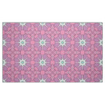 Geometric floral pattern in pink and green hue fabric