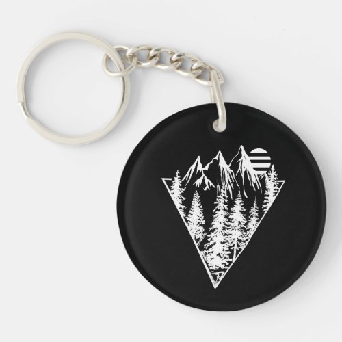 Geometric landscape of pine trees and mountain keychain