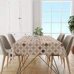 Geometric pattern of brown and pink polka dots tablecloth