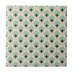 Geometric pattern of teal, beige, and black shapes ceramic tile