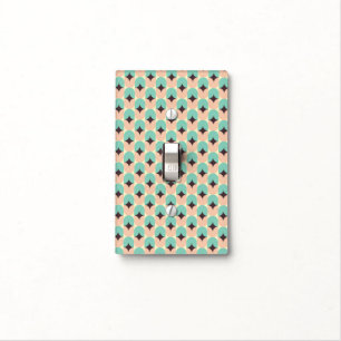 Geometric pattern of teal, beige, and black shapes light switch cover