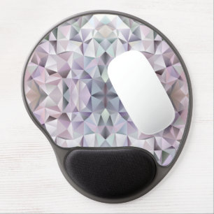 Geometric-patterned mouse pad with a wrist rest