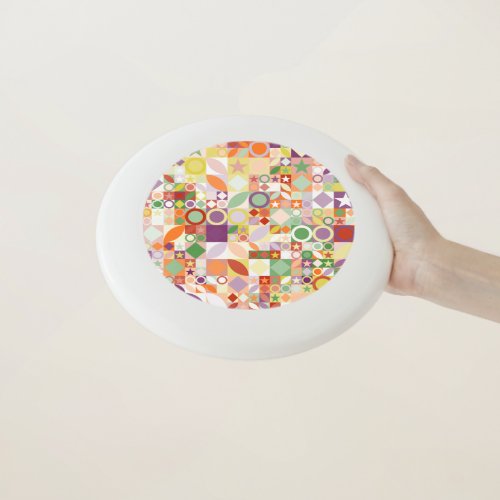 Geometric shapes with warm tendencies Wham_O frisbee