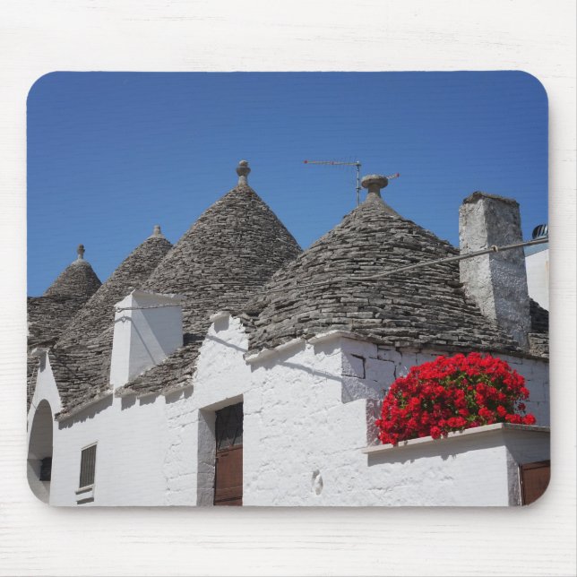 Geranium flowers and trulli houses in Alberobello Mouse Pad (Front)