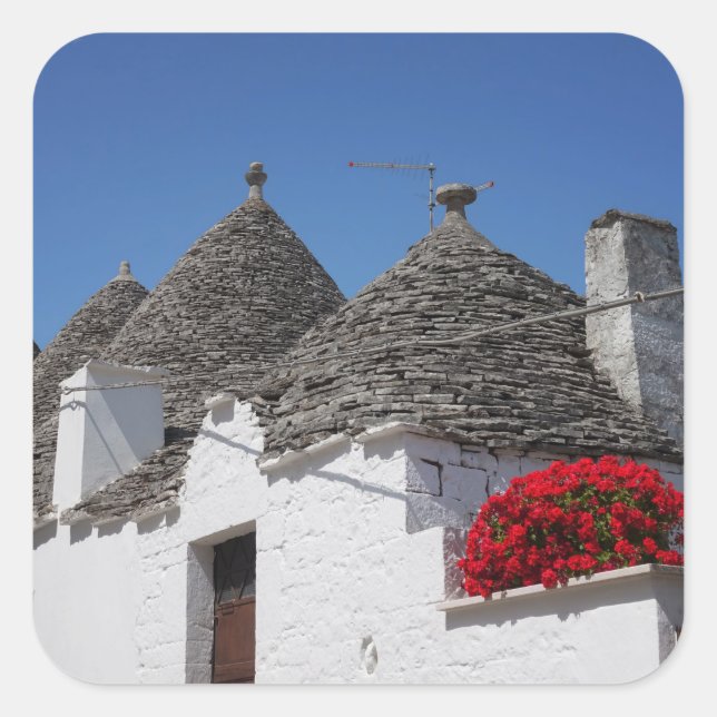 Geranium flowers and trulli houses in Alberobello Square Sticker (Front)
