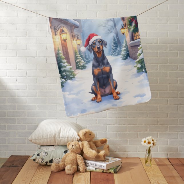 German Pinscher Snowy Courtyard Santa Hat Baby Blanket (In Situ)