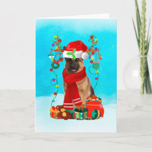 German Shepherd in snow with Christmas gifts Card